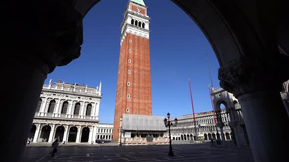 Beautiful moving forward shot of Piazza San Marco and its bell tower in Venice (Italy). Main square