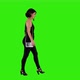 Pretty woman walking for a date night over green screen in long shot. - VideoHive Item for Sale