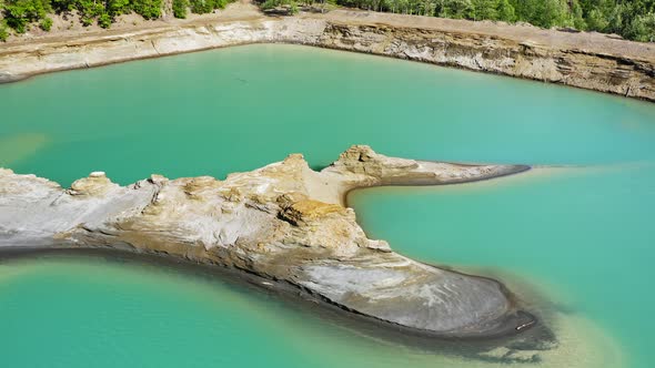 Drone View of the Turquoise Lake Formed As a Result of Mining Waste