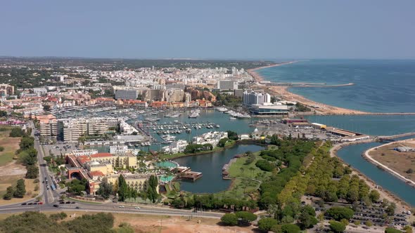 Aerial Video of the Tourist Portuguese Town of Vilamoura with Views of the Beaches and Docks for