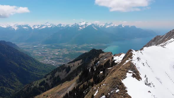 Aerial Drone View on Snowy Peaks of Swiss Alps. Switzerland. Rochers-de-Naye Mountain Peak.