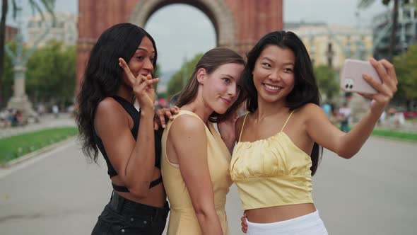 Multiethnic Girlfriends Taking Selfie While Travelling Together in Europe City and Sightseeing