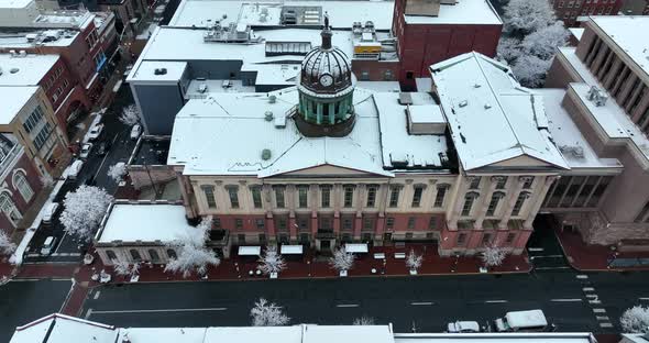 Lancaster PA Courthouse. Municipal government building in winter snow in USA. Copper dome.