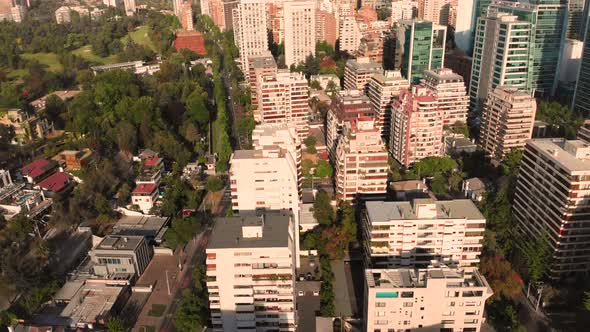 Aerial flying forward over apartment buildings on a sunny afternoon, Santiago de Chile-4K