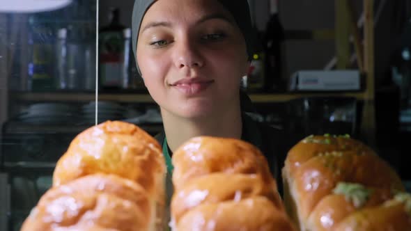 Bakeshop, Beautiful Woman of Air Conditioning Racks Fresh Fragrant Buns Cooked in Bakery, Healthy