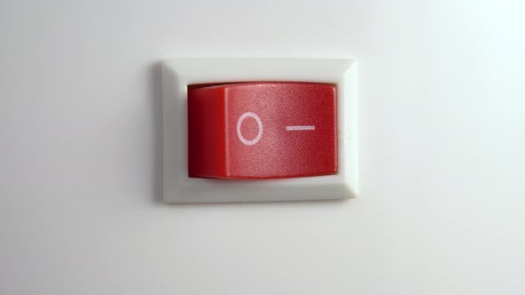 Red switch off. Pressing the button to turn off the device