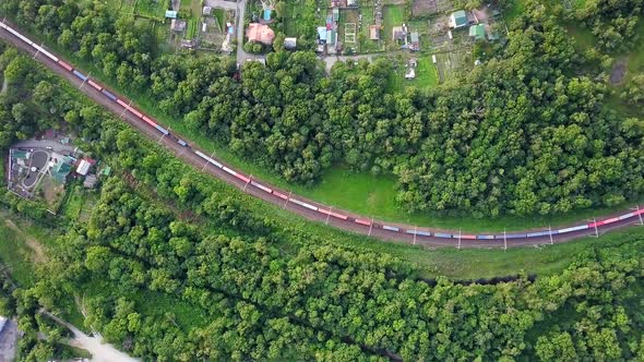 Drone View of a Moving Freight Train in the Suburbs of Vladivostok