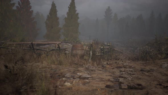 An Old Wood Fence with a Country Field Behind It alt