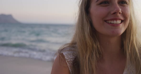 Caucasian woman enjoying her time seaside