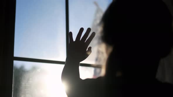 Girl Stretches Out Her Hand in the Sun Close Up Silhouette Dream of Happiness Sunlight