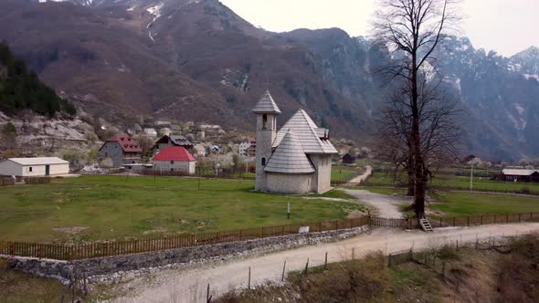 Dronehsot of a Church in the Alps