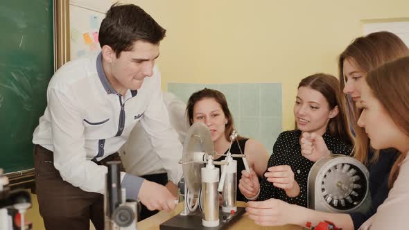 Students Play with Electroforming Machine Before the Lesson of Physics