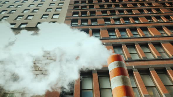 Pipe with Excess Steam From the Steam System of New York. Bright Orange Striped