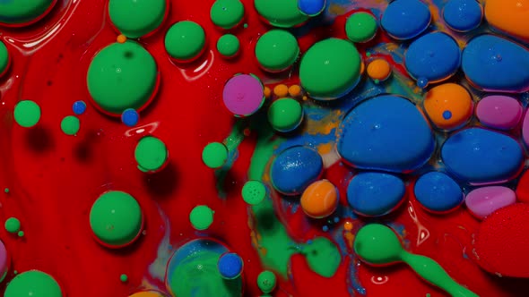 Macro Structure of Multicolored Water Paint Oil Bubbles Movement Bright Colorful Acrylic Painting