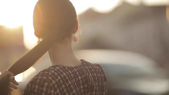 Jolly Gorgeous Lady in Trendy Jacket in Sunlight