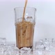 A refreshing drink of stake is poured into a glass beaker with a tube. - VideoHive Item for Sale