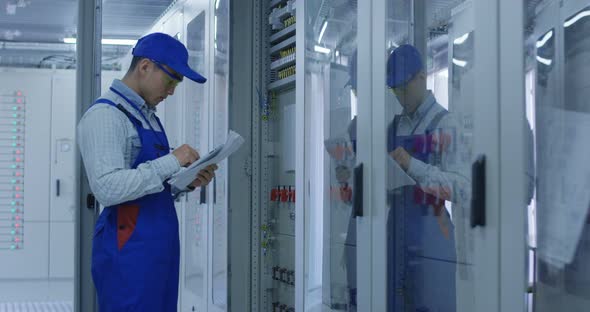 Electrical Worker Doing an Inspection