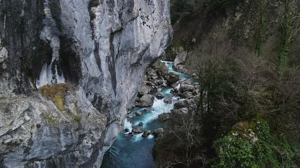 Abandoned Old Dangerous Road in a Narrow Gorge Along the Mzymta River