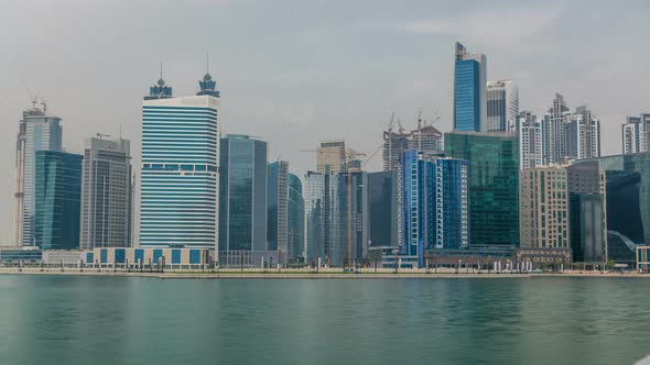 Panoramic Timelapse View of Business Bay and Downtown Area of Dubai Reflection in a River