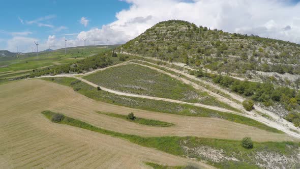 Rural Landscapes of Cyprus, Flyover Above Agricultural Fields With Wind Turbines