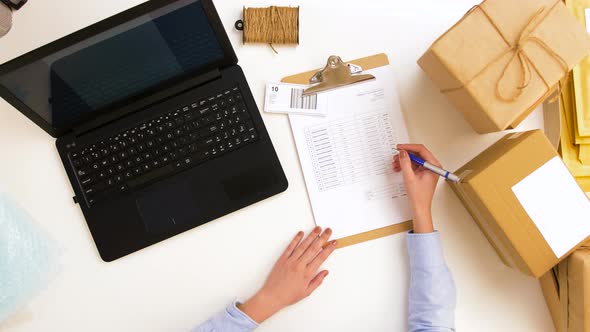 Woman with Laptop and Clipboard at Post Office 6