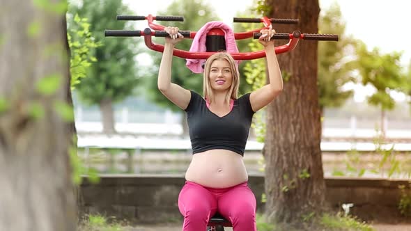 Pregnant woman doing sports, fitness for pregnant women