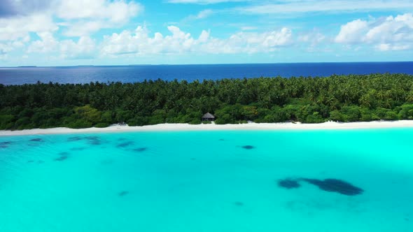 Aerial drone view seascape of idyllic coast beach lifestyle by transparent ocean and white sand back