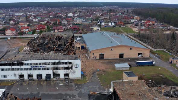 Aerial view of the destroyed and burnt houses. alt