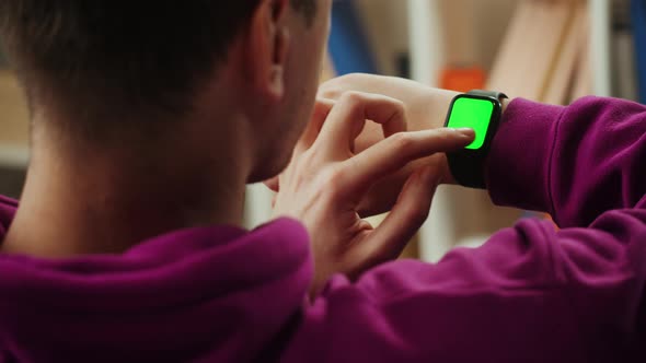 Man Using Smartwatch with Chroma Key Closeup