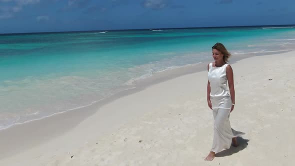 Tropical Vacation in Dominican Republic Woman is Walking on the Beach