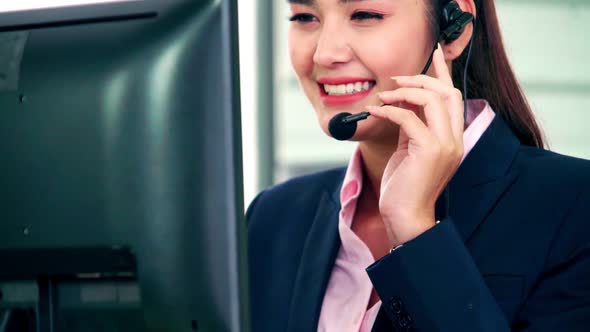 Business People Wearing Headset Working in Office