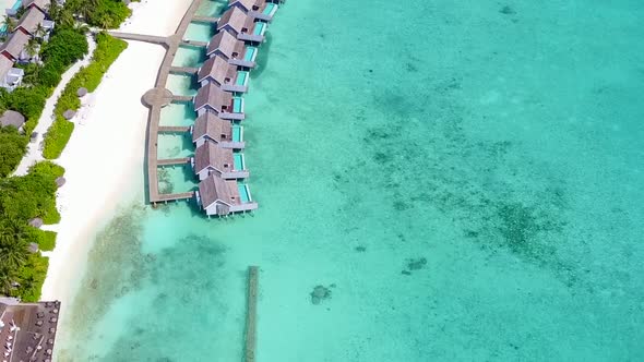 Drone abstract of tourist beach voyage by blue water and sand background