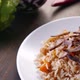 Uzbek Plov or Pilaf on a White Plate  Food of Central Asia - VideoHive Item for Sale