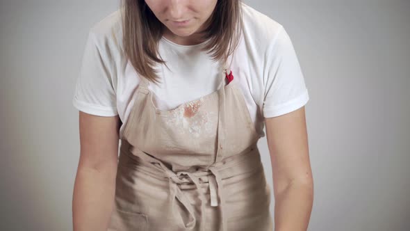 Young Woman Is Kneading a Clay Pieces, Shaping Balls, Close-up of Hands,