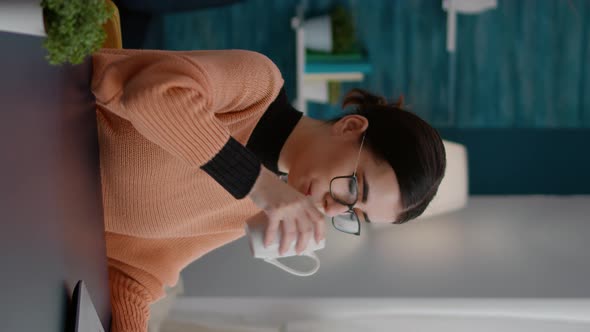 Vertical Video Female Student Typing on Laptop to Do Remote School Work alt