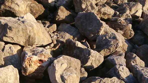 Stone and rock - close up. Heap of of crushed pieces used as natural building material