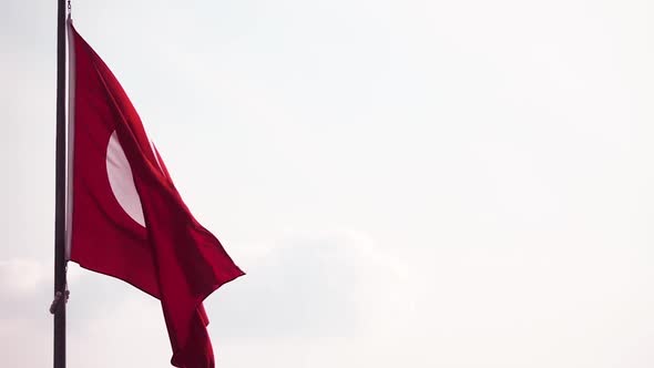 Flag of Turkey Waving in the Wind Blue Sky on Background. Slow Motion