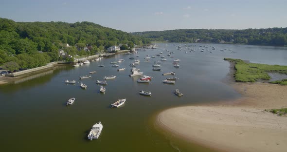 Forward Aerial Pan of Boats Anchored on Cold Spring Harbor