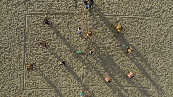 People Playing Volleyball On the Beach