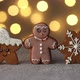 Christmas gingerbread cookies on the background of garlands of warm bokeh lights - VideoHive Item for Sale