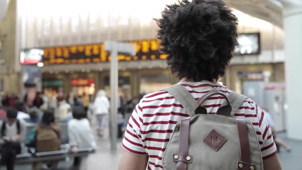 Man walking to the train at station, slow motion