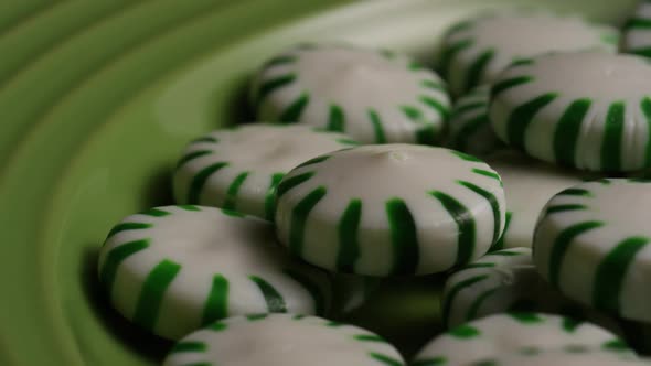 Rotating shot of spearmint hard candies - CANDY SPEARMINT 055