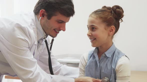 A Nice Little Girl Is on the Doctor's Examination