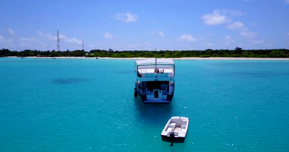 Natural above travel shot of a summer white paradise sand beach and blue ocean background in hi res 