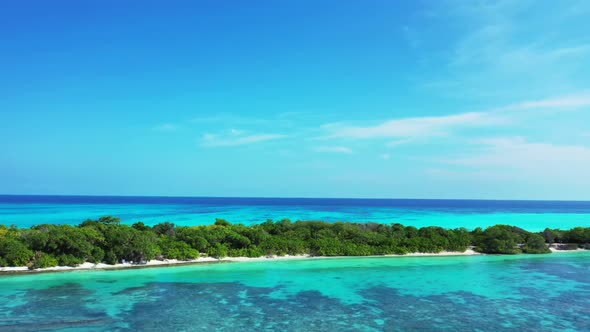 Aerial top view tourism of idyllic coast beach trip by aqua blue ocean with white sandy background o