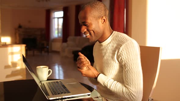 Businessman Working at his Laptop