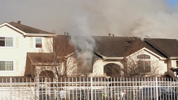 Condo Fire Smoke Billowing Out of Window