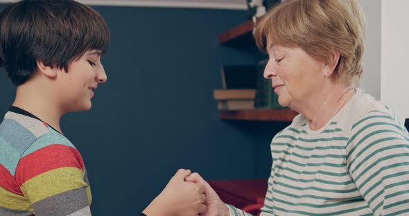 Grandmother and Teenage Grandson are Playing a Game