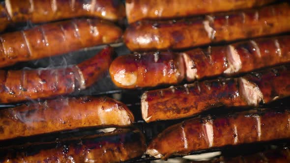 Delicious Fried Sausages on Home Barbecue