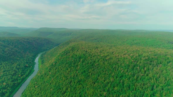 Aerial Video of Clouds Mountains Forest and Mountain River